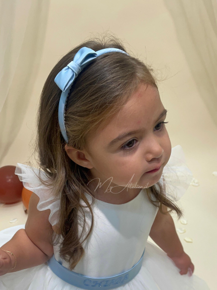 Cerchietto per capelli con fiocco celeste