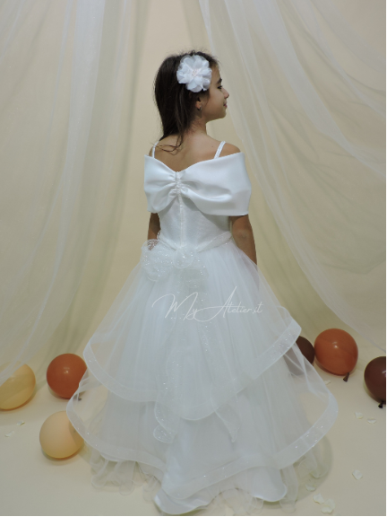Vestito comunione con grande fiocco sulle spalle