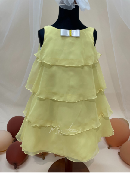 Abitino giallo a balze con fiocco strass Tg.5 anni