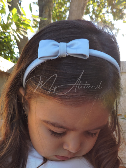 Cerchietto per capelli con fiocco celeste